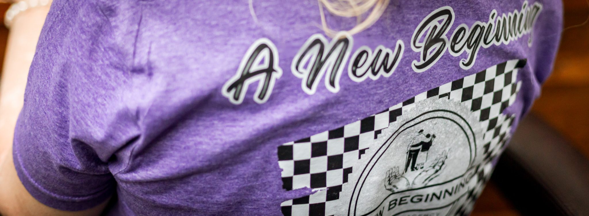 A New Beginning team shirt
